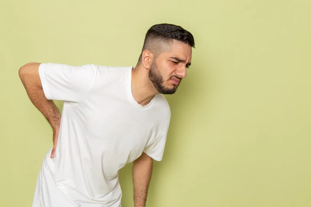 Low Back Pain: Causes, Warning Signs & When It’s More Than Just a Muscle Pull